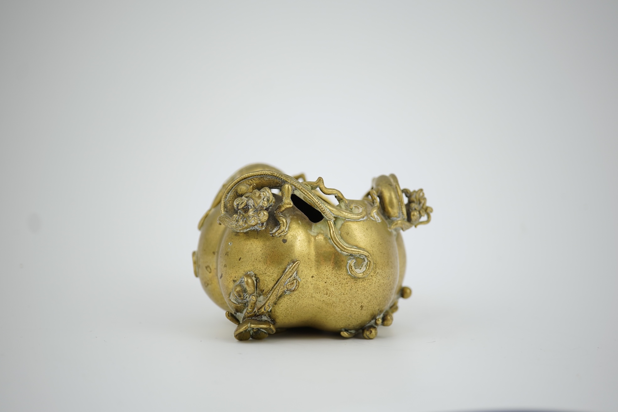 A large Chinese bronze rectangular censer and cover, Xuande seal mark, and a ‘plum blossom and chilong’ bronze censer, both 19th century